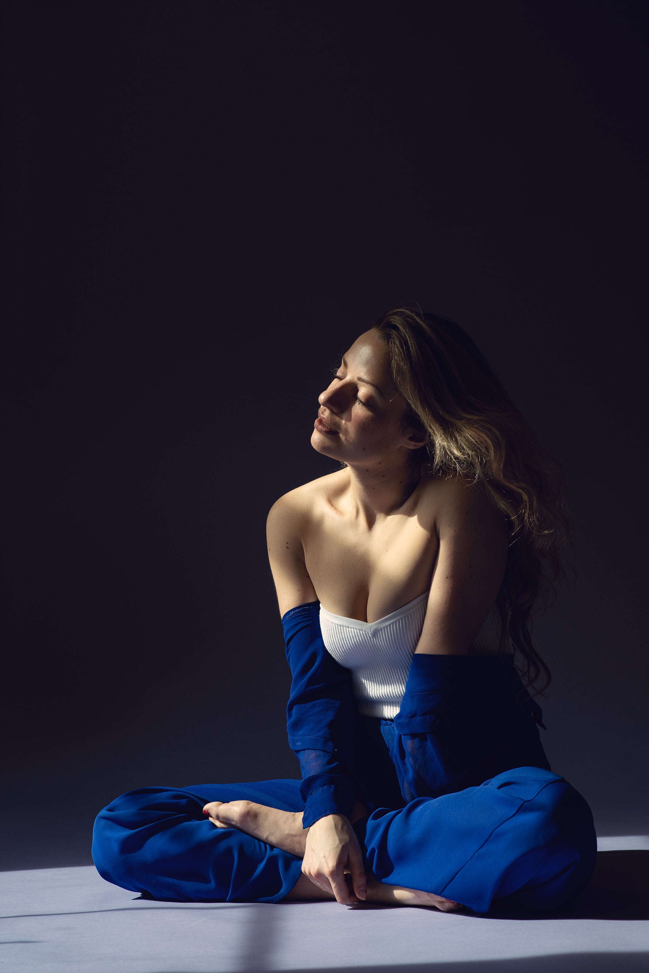 Women sitting with sunlight on her face